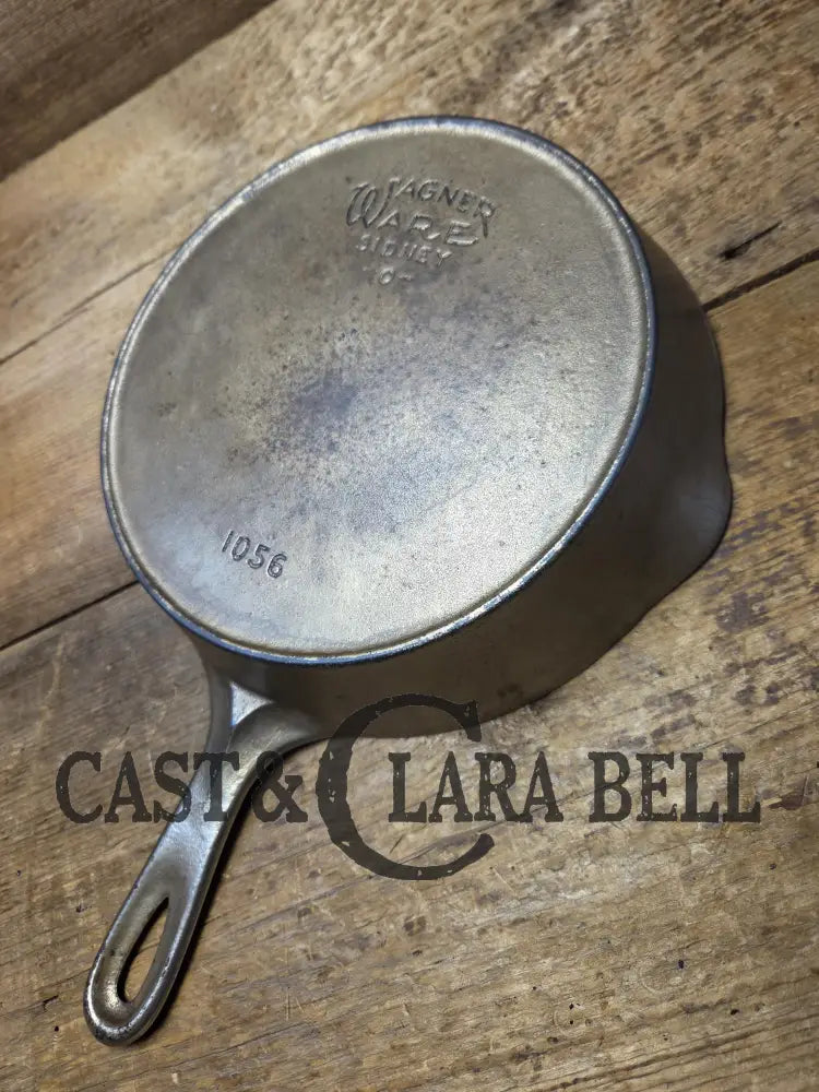 HTF 1924 Wagner Ware Sidney -O- #6 Skillet with Heat Ring 1056. Nickel outside finish black iron interior. Beautiful