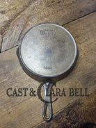 HTF 1924 Wagner Ware Sidney -O- #6 Skillet with Heat Ring 1056. Nickel outside finish black iron interior. Beautiful