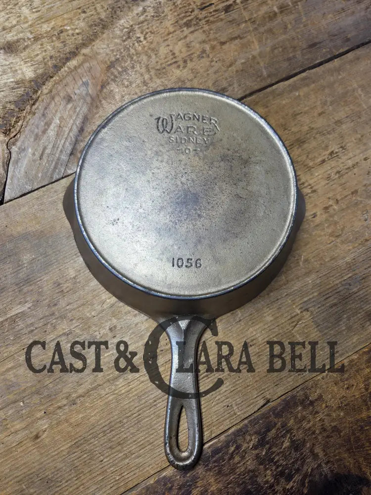 HTF 1924 Wagner Ware Sidney -O- #6 Skillet with Heat Ring 1056. Nickel outside finish black iron interior. Beautiful