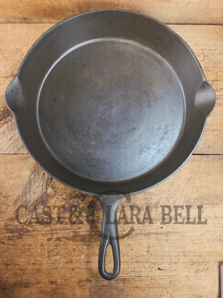 HUGE and hard to find 1910’s Early Favorite Piqua Ware #12 Cast Iron Skillet Smiley Logo great for gas or coil tops!