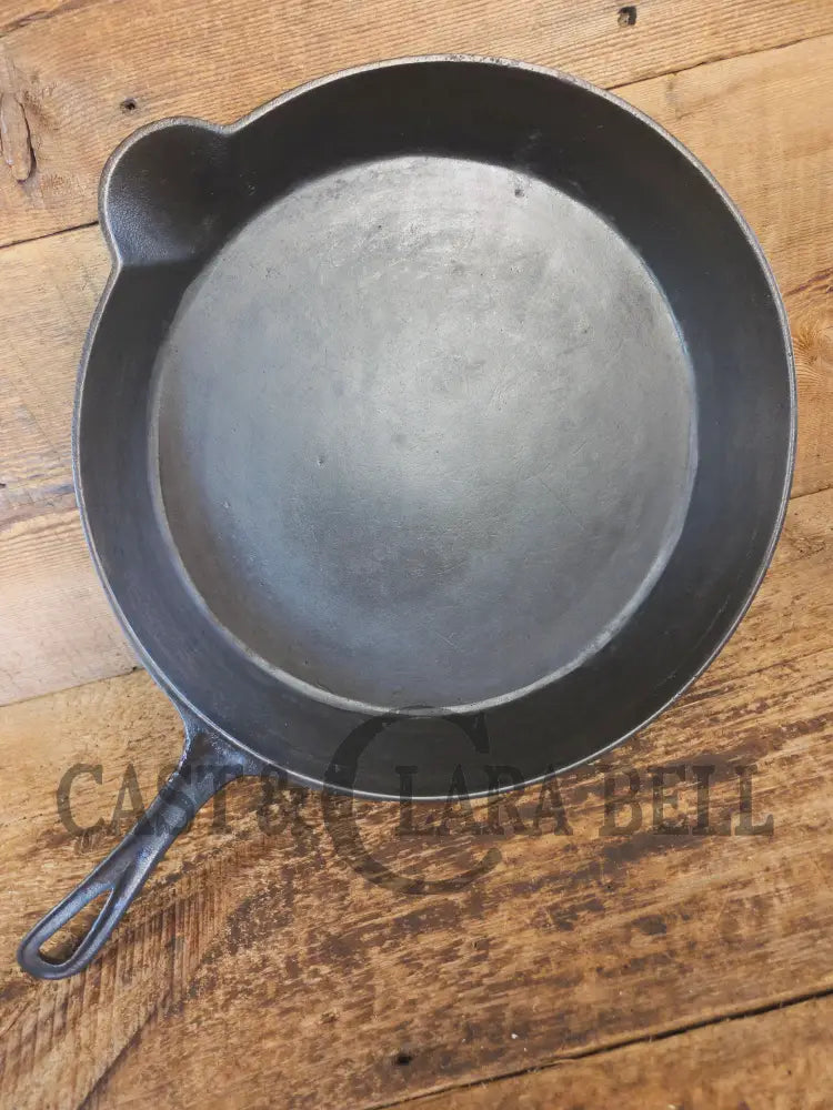 Huge Antique gate-marked unknown #12 skillet. Est 1880’s. Left single spout heat ring bottom w/ pointy handle - Skillet