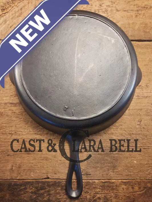 I love this skillet! Classic 1910’s Lodge Raised #7 Heat Ring Single Notch. Light sleek and ready to cook with! Skillet