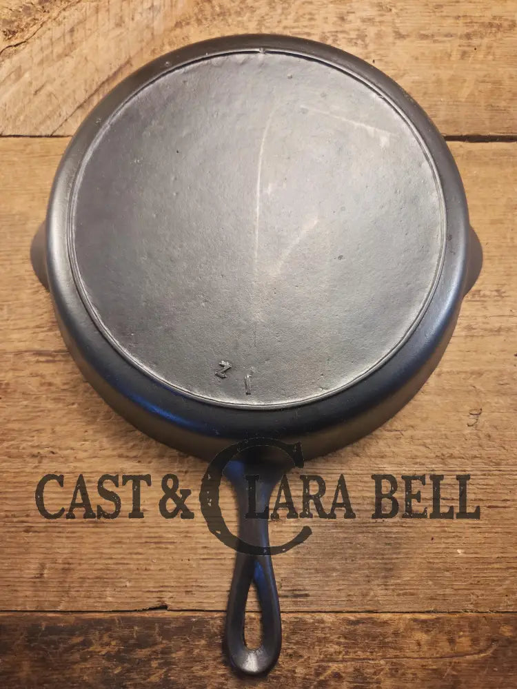 I love this skillet! Classic 1910’s Lodge Raised #7 Heat Ring Single Notch. Light sleek and ready to cook with! Skillet