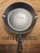 I love this skillet! Classic 1910’s Lodge Raised #7 Heat Ring Single Notch. Light sleek and ready to cook with! Skillet