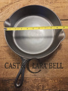 I love this skillet! Classic 1910’s Lodge Raised #7 Heat Ring Single Notch. Light sleek and ready to cook with! Skillet