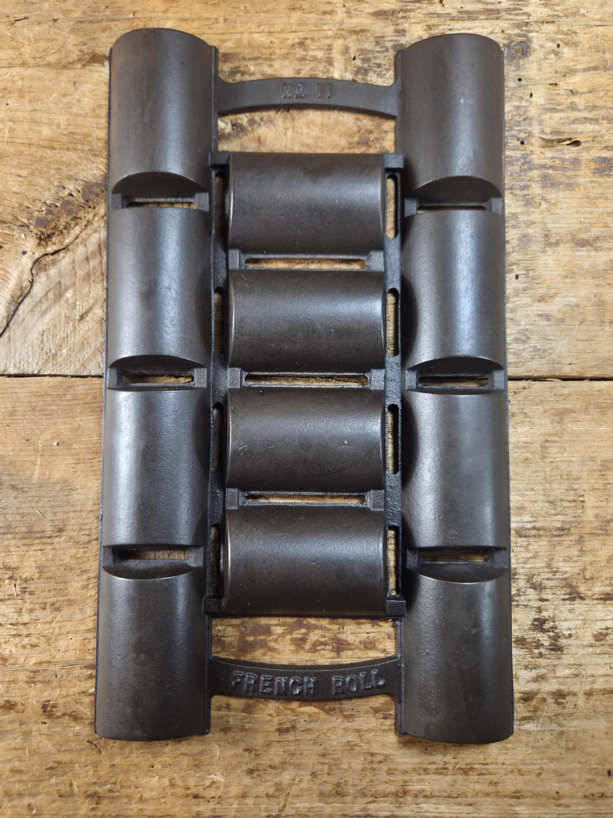 Unknown French Roll No. 11 Pan w/ raised No. 11 & French Roll markings. Rumored Griswold but likely Unknown Beautiful
