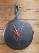 Custom made wall hanging Griswold Clock. Repurposed from cracked skillet. Comes with interchangeable clock mechanics.