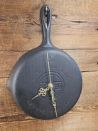 Custom made wall hanging Griswold Clock. Repurposed from cracked skillet. Comes with interchangeable clock mechanics.