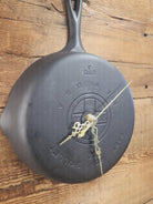 Custom made wall hanging Griswold Clock. Repurposed from cracked skillet. Comes with interchangeable clock mechanics.