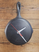 Custom made wall hanging Griswold Clock. Repurposed from cracked skillet. Comes with interchangeable clock mechanics.
