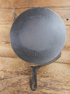 What a funky creation! Huge Repurposed Wagner #11 cast iron spatula. Possible pizza peel for your homemade pizzas!
