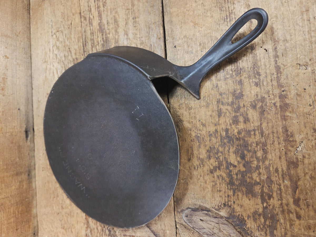 What a funky creation! Huge Repurposed Wagner #11 cast iron spatula. Possible pizza peel for your homemade pizzas!