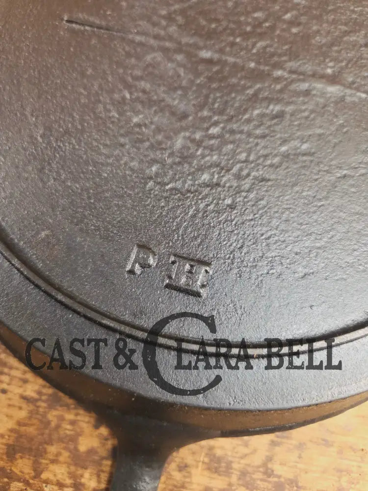 Late 1800’s Semi Fancy handled #9 cast iron skillet with Raised PH on the bottom. Beautiful skillet amazing daily user!