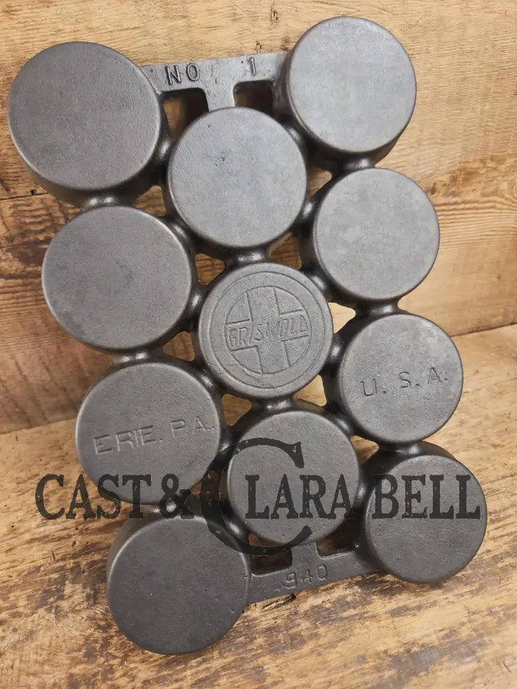 Most rare variation (Rarity 6) Fully Marked Griswold No. 1 Gem Pan Block Logo 11 cup p/n 940. This piece is flat out