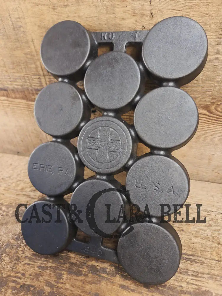 Most rare variation (Rarity 6) Fully Marked Griswold No. 1 Gem Pan Block Logo 11 cup p/n 940. This piece is flat out