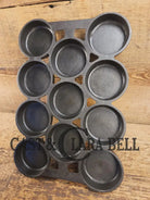 Most rare variation (Rarity 6) Fully Marked Griswold No. 1 Gem Pan Block Logo 11 cup p/n 940. This piece is flat out