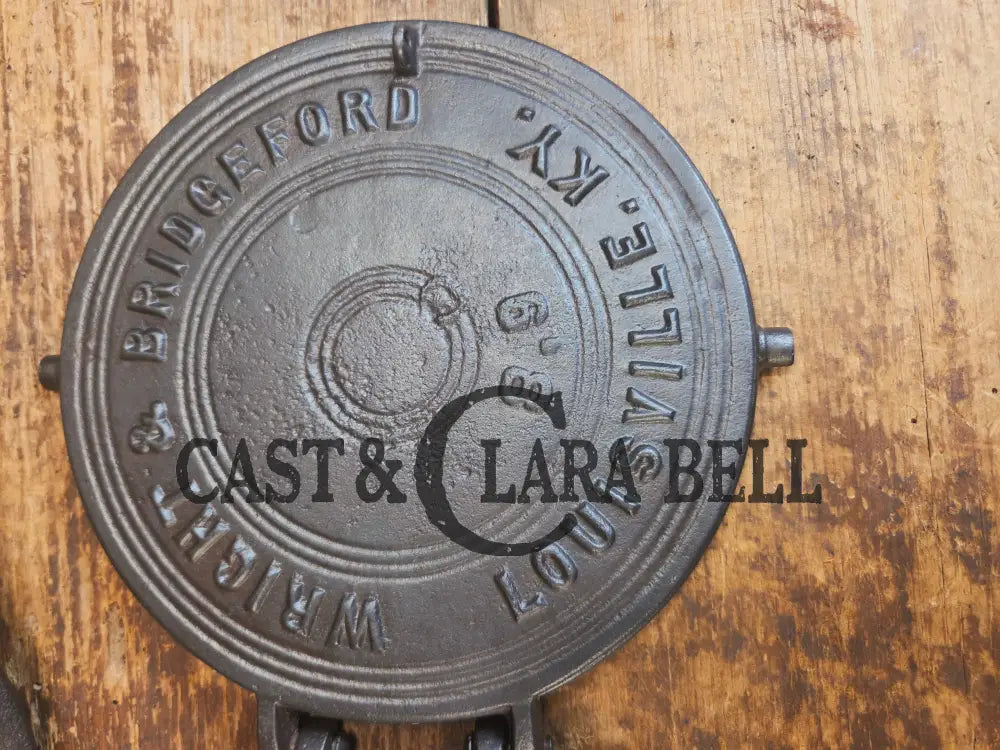 Oh MY! Civil War Era made Wright & Bridgeford antique waffle iron. Ready to make crispy waffles!ook at the waffle
