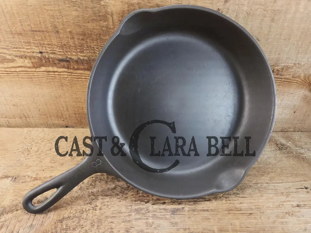 Wagner Ware #8 Cast Iron Skillet with Stylized Logo and Smooth Bottom 1058 M SC24 Skillet