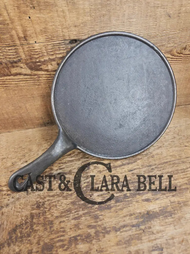 Piece of American history. Late 1800’s antique #7 Round Cast Iron Stove Eye Griddle. Elegant and hard working. SC24