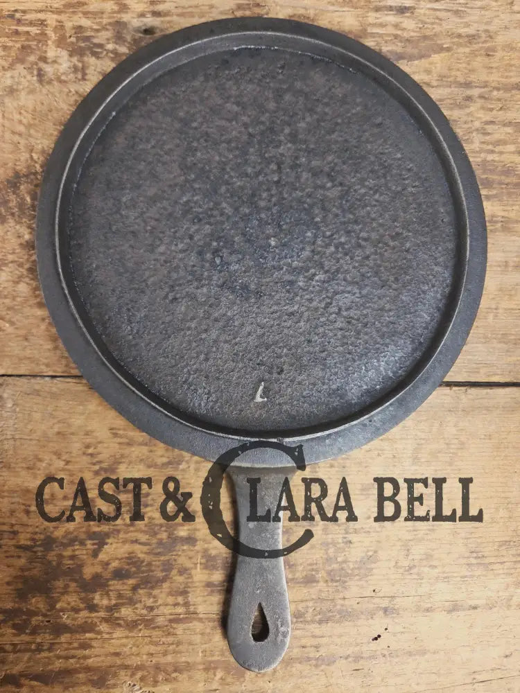 Piece of American history. Late 1800’s antique #7 Round Cast Iron Stove Eye Griddle. Elegant and hard working. SC24