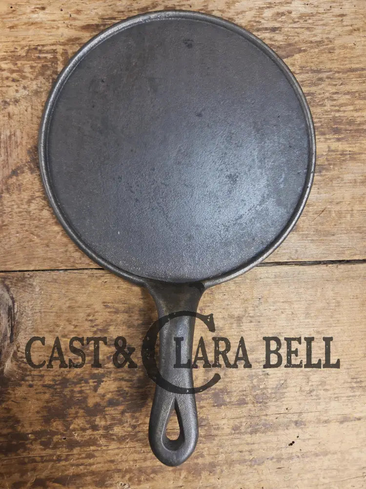 Piece of American history. Late 1800’s antique #7 Round Cast Iron Stove Eye Griddle. Elegant and hard working. SC24