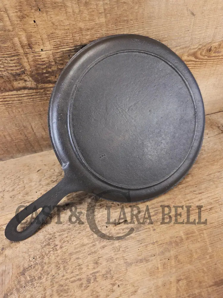 Piece of American history. Late 1800’s antique Gate marked Round Cast Iron Stove Eye Griddle. Elegant and hard working.
