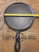 Piece of American history. Late 1800’s antique Gate marked Round Cast Iron Stove Eye Griddle. Elegant and hard working.