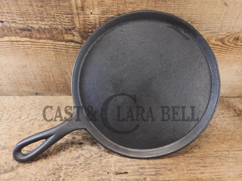 Piece of American history. Late 1800’s antique Gate marked Round Cast Iron Stove Eye Griddle. Elegant and hard working.