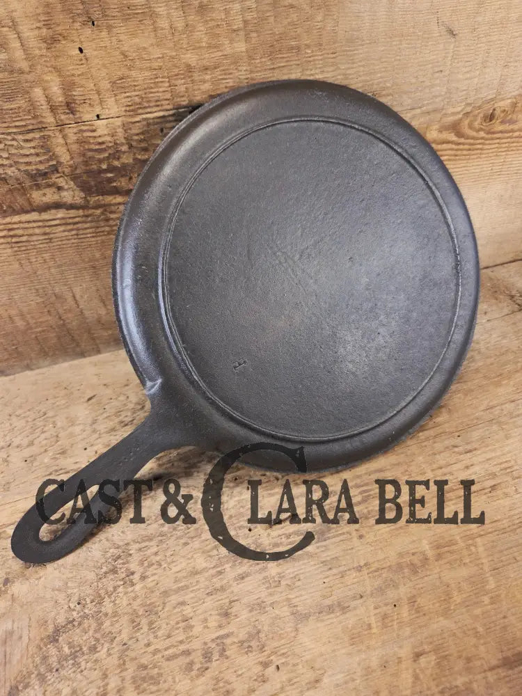 Piece of American history. Late 1800’s antique Gate marked Round Cast Iron Stove Eye Griddle. Elegant and hard working.