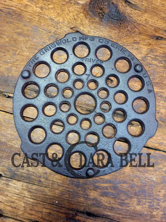 Price To Sell! Griswold Dutch Oven #7 Trivet. Hairline Crack. #205 Will Work Perfectly For You!