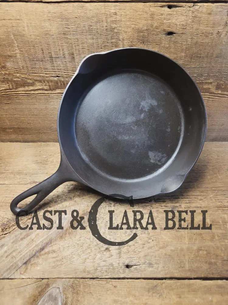 Priced to Sell! 1920’s Era Wagner Ware Sidney O. #7D Skillet with Heat Ring. Great value because of small pitted area