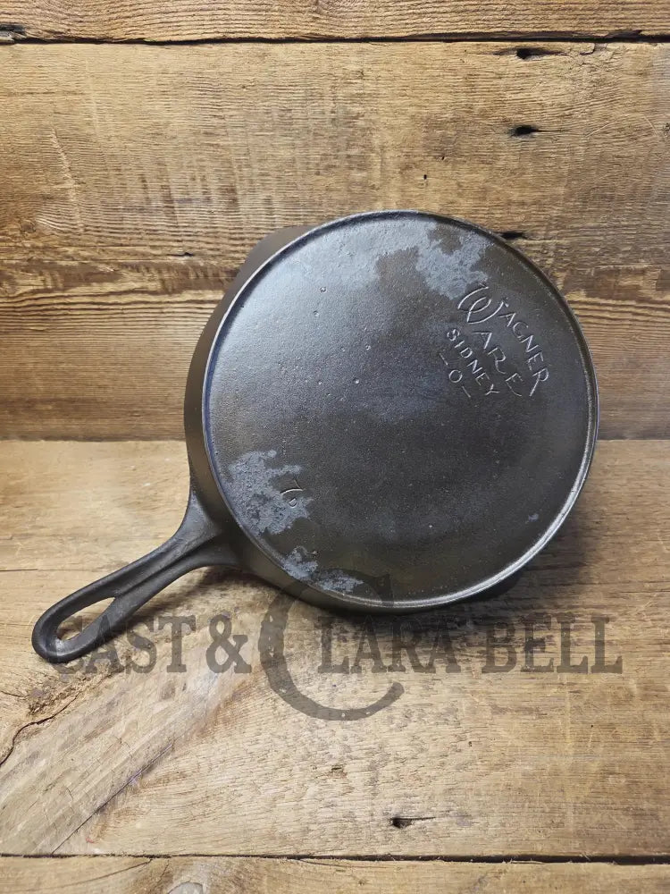 Priced to Sell! 1920’s Era Wagner Ware Sidney O. #7D Skillet with Heat Ring. Great value because of small pitted area