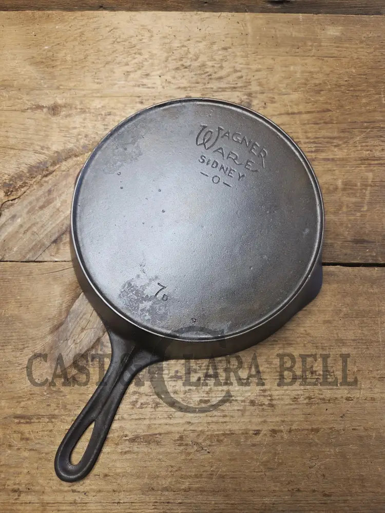 Priced to Sell! 1920’s Era Wagner Ware Sidney O. #7D Skillet with Heat Ring. Great value because of small pitted area