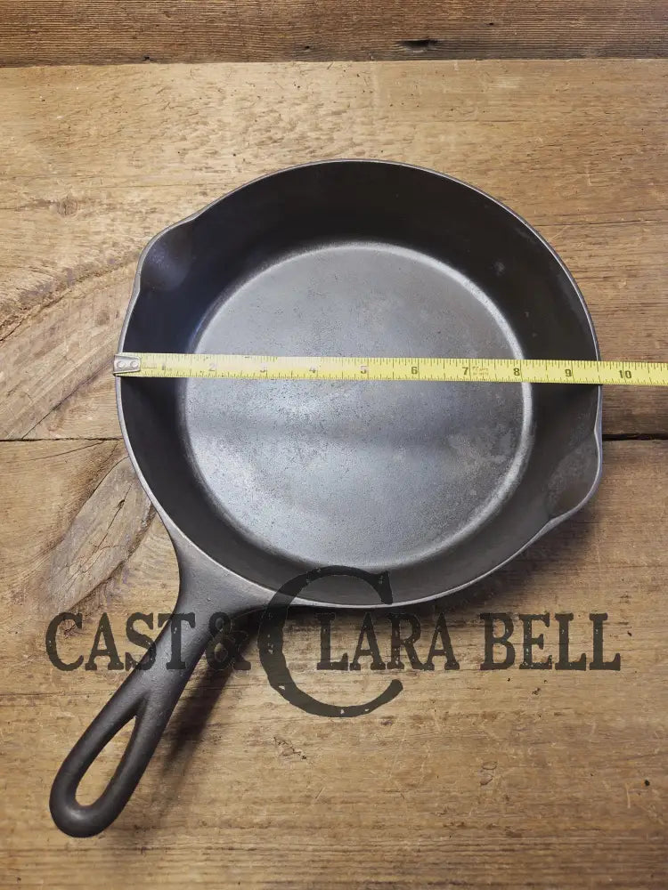 Priced to Sell! 1920’s Era Wagner Ware Sidney O. #7D Skillet with Heat Ring. Great value because of small pitted area