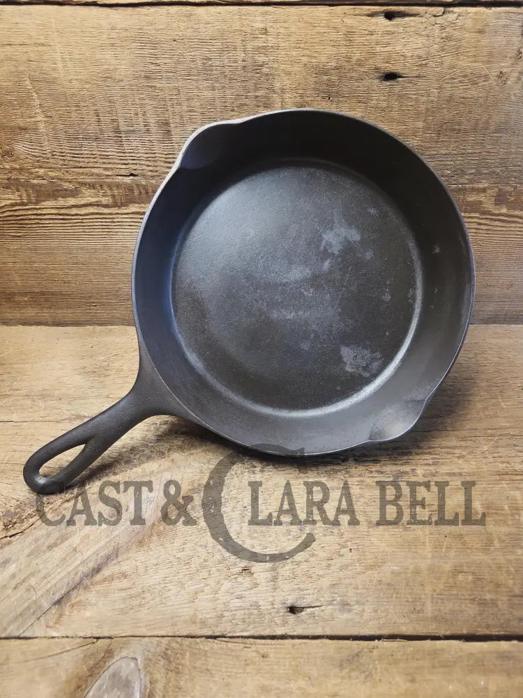 Priced to Sell! 1920’s Era Wagner Ware Sidney O. #7D Skillet with Heat Ring. Great value because of small pitted area