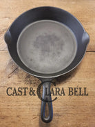 Priced to Sell! 1920’s Favorite Piqua Ware No. 9 B cast iron Skillet with Heat Ring and ’Smiley’ Logo. Gorgeous skillet