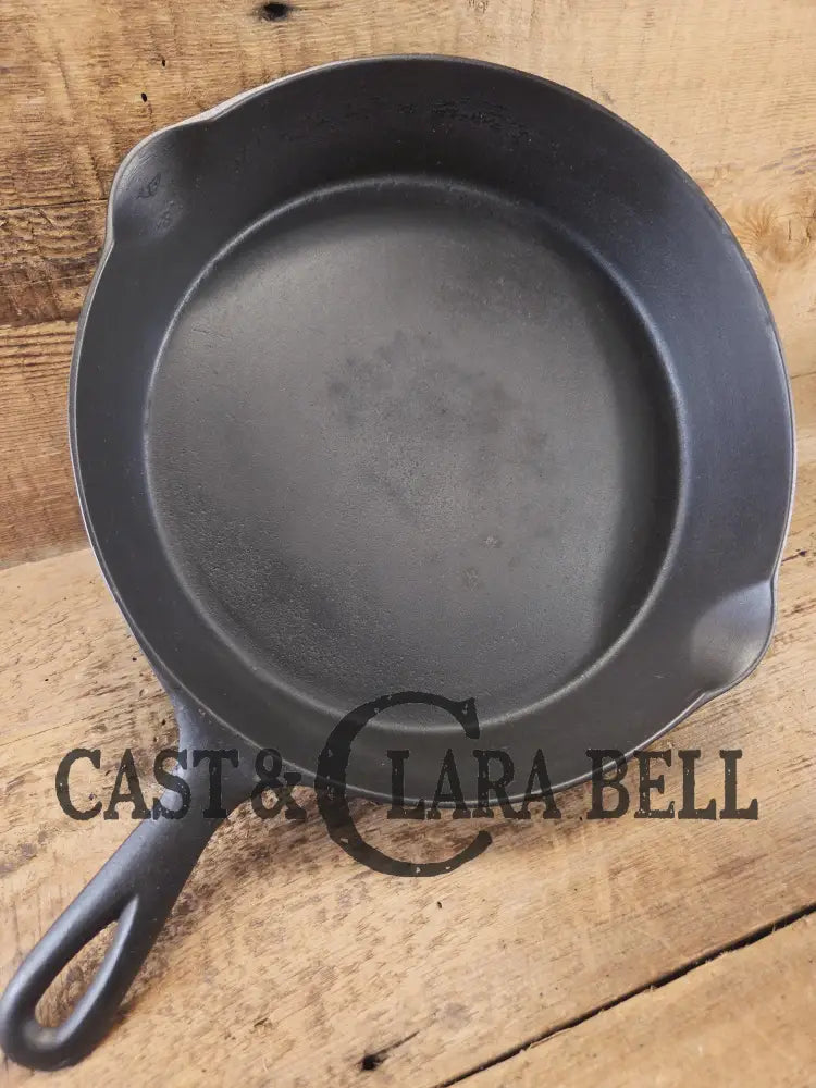 Priced to Sell! 1920’s Favorite Piqua Ware No. 9 B cast iron Skillet with Heat Ring and ’Smiley’ Logo. Gorgeous skillet