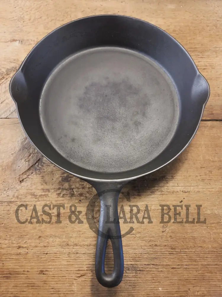 Priced to Sell! 1920’s Favorite Piqua Ware No. 9 B cast iron Skillet with Heat Ring and ’Smiley’ Logo. Gorgeous skillet
