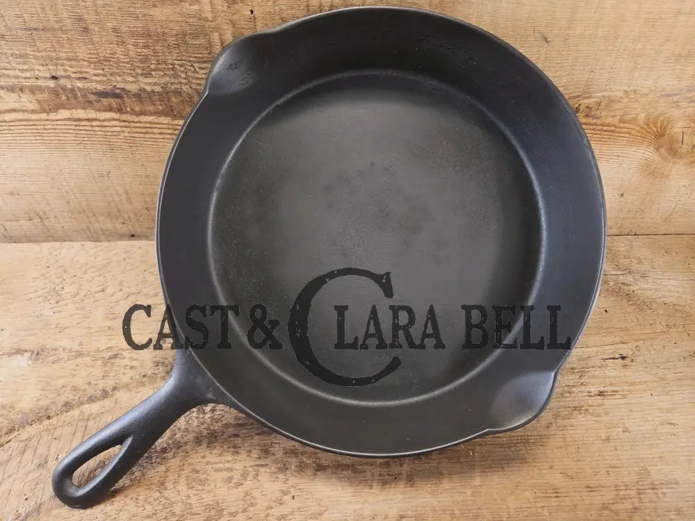 Priced to Sell! 1920’s Favorite Piqua Ware No. 9 B cast iron Skillet with Heat Ring and ’Smiley’ Logo. Gorgeous skillet