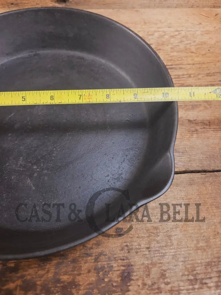 Priced to sell daily workhorse! Early 1900’s Lodge #8 Skillet with 3 Notch Heat Ring and raised RI. Great first pan!