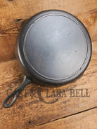 Priced to sell daily workhorse! Early 1900’s Lodge #8 Skillet with 3 Notch Heat Ring and raised RI. Great first pan!