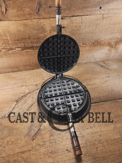 Priced to Sell Early 1900’s ’Wagner’ cast iron waffle iron. #1408 Original wood handles Waffle Iron