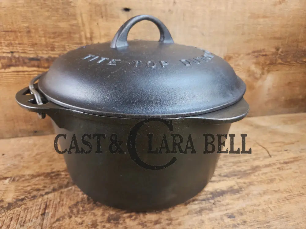 Rare 1920’s Griswold #8 Tite-Top Cast Iron DEEP Dutch Oven 1298 and Matching High Dome Raised Logo lid. VERY cool.