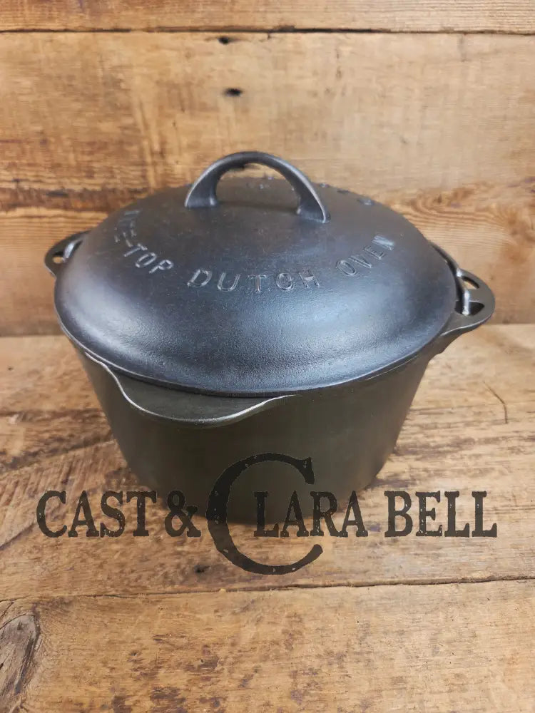 Rare 1920’s Griswold #8 Tite-Top Cast Iron DEEP Dutch Oven 1298 and Matching High Dome Raised Logo lid. VERY cool.