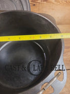Rare 1920’s Griswold #8 Tite-Top Cast Iron DEEP Dutch Oven 1298 and Matching High Dome Raised Logo lid. VERY cool.