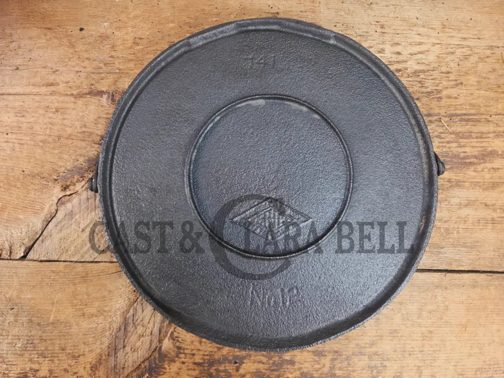Rare find! 1890’s Griswold’s Erie #12 Bailed Round Cast Iron Diamond Logo Griddle. Very hard to find! Griddle