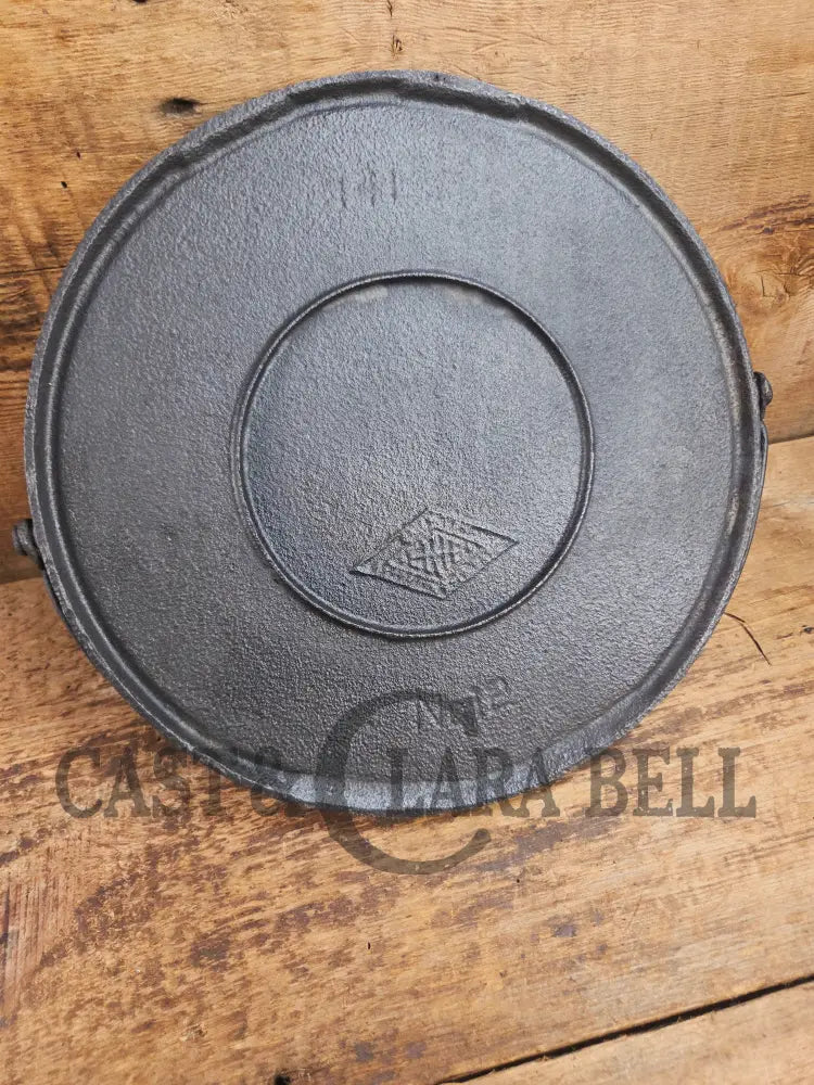 Rare find! 1890’s Griswold’s Erie #12 Bailed Round Cast Iron Diamond Logo Griddle. Very hard to find! Griddle