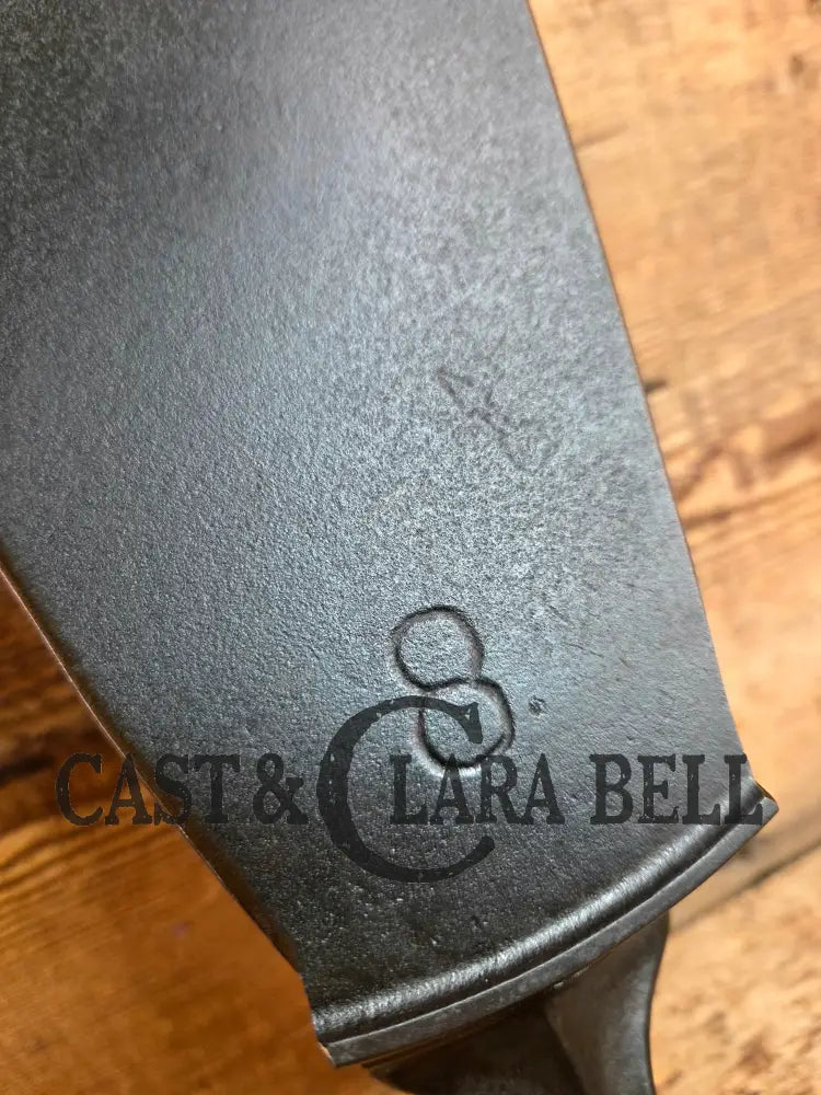 Show stopper. Custom made one of a kind Griswold Erie 2nd Series TAMPER Makers Mark! A high value collectors pan kept