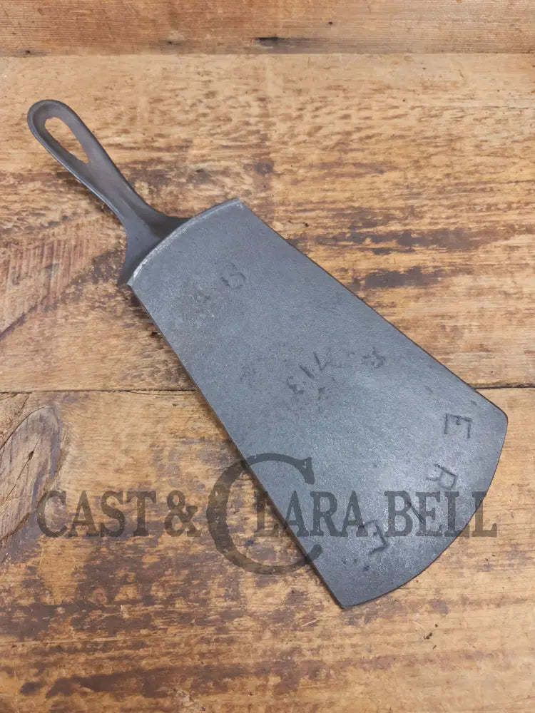 Show stopper. Custom made one of a kind Griswold Erie 3rd Series #9 spatula! A high value collectors pan kept alive as