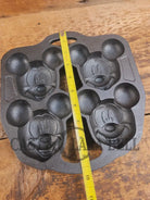 So cool! Lodge made Mickey Mouse Gem Pan. Makes great mini cakes! - Bakeware